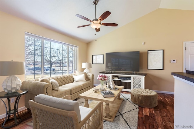 living room featuring vaulted ceiling, ceiling fan, and hardwood / wood-style flooring