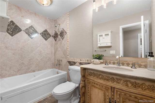 bathroom featuring tile walls, shower / tub combination, vanity, and toilet