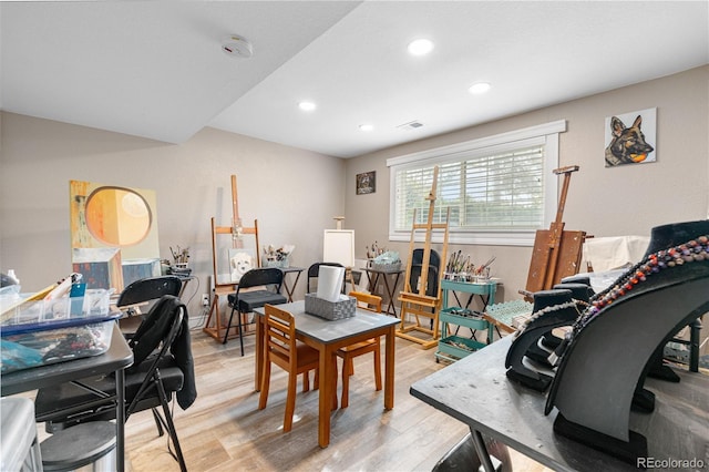 office space featuring light wood finished floors and recessed lighting