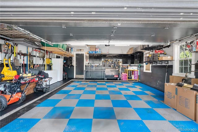 garage with freestanding refrigerator