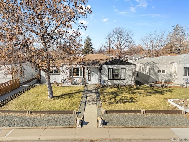 ranch-style house with a front yard