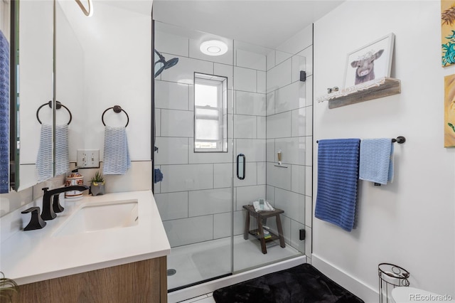 bathroom with vanity and walk in shower