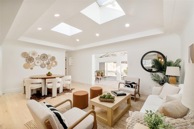 621 S Harrison Ln, Denver, CO 80209 - living room featuring a skylight, a tray ceiling, baseboards, recessed lighting, and light wood finished floors