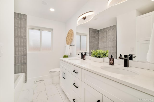 621 S Harrison Ln, Denver, CO 80209 - bathroom featuring toilet, marble look tiles, double vanity, recessed lighting, and baseboards