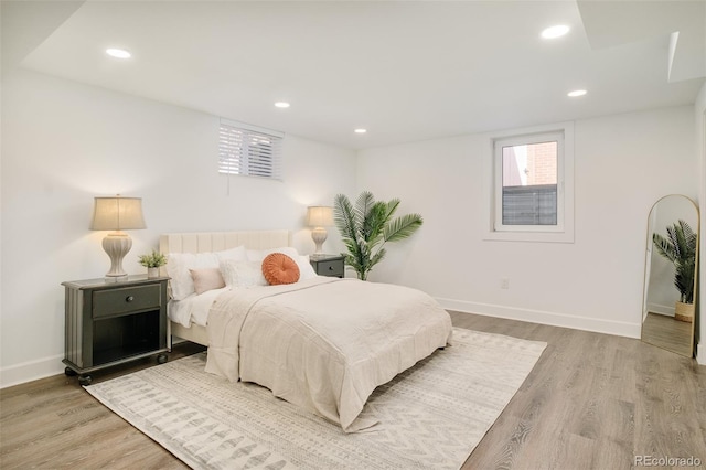 621 S Harrison Ln, Denver, CO 80209 - bedroom featuring wood finished floors, baseboards, and recessed lighting