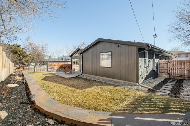 621 S Harrison Ln, Denver, CO 80209 - view of side of home featuring a patio