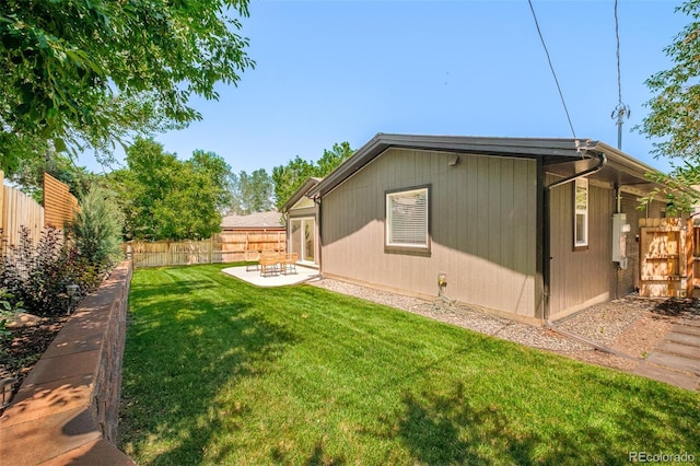 621 S Harrison Ln, Denver, CO 80209 - fenced backyard with a patio