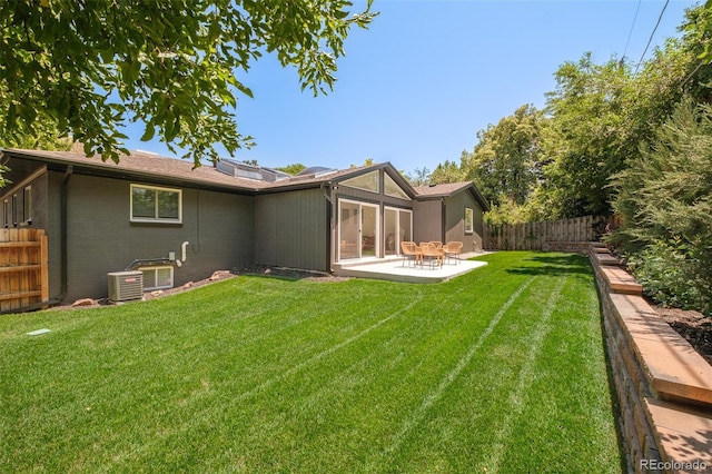 621 S Harrison Ln, Denver, CO 80209 - back of house featuring brick siding and a patio