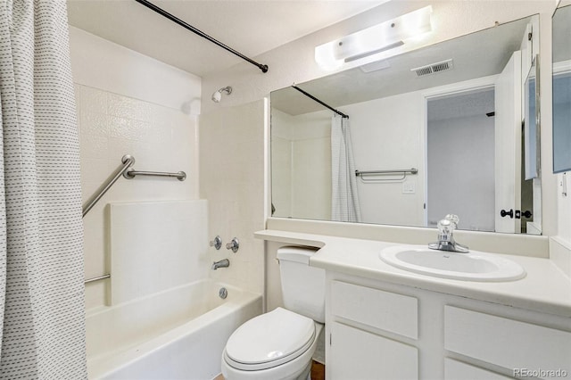 full bath with visible vents, toilet, vanity, and shower / bath combo