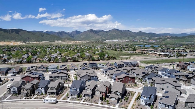 8049 Monte Vista Cir, Littleton, CO 80125 - aerial perspective of suburban area featuring a water and mountain view