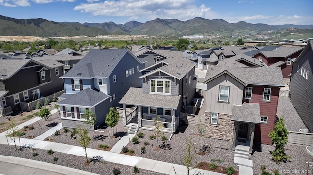 8049 Monte Vista Cir, Littleton, CO 80125 - aerial view of residential area featuring a mountainous background