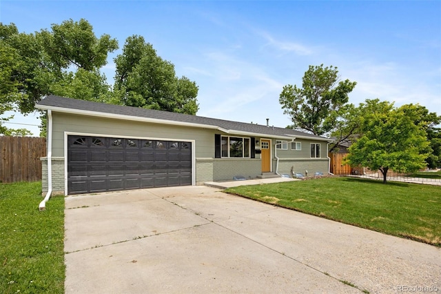 1205 W 101st Ave, Northglenn, CO 80260 - ranch-style house featuring concrete driveway, a garage, and brick siding