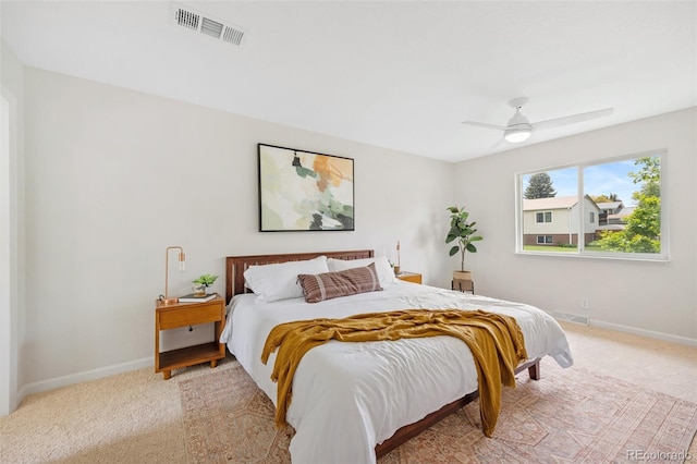 1205 W 101st Ave, Northglenn, CO 80260 - bedroom with light colored carpet, baseboards, and ceiling fan
