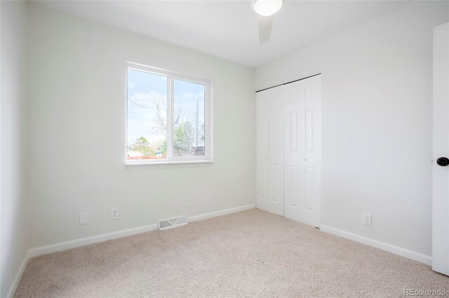 1205 W 101st Ave, Northglenn, CO 80260 - unfurnished bedroom featuring carpet flooring, baseboards, and a closet