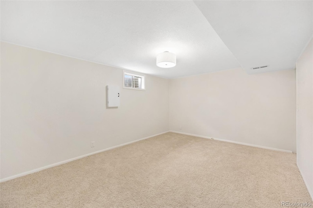1205 W 101st Ave, Northglenn, CO 80260 - carpeted spare room featuring baseboards