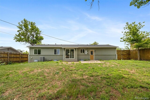 1205 W 101st Ave, Northglenn, CO 80260 - back of house with cooling unit and brick siding