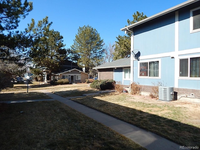 view of yard featuring central AC