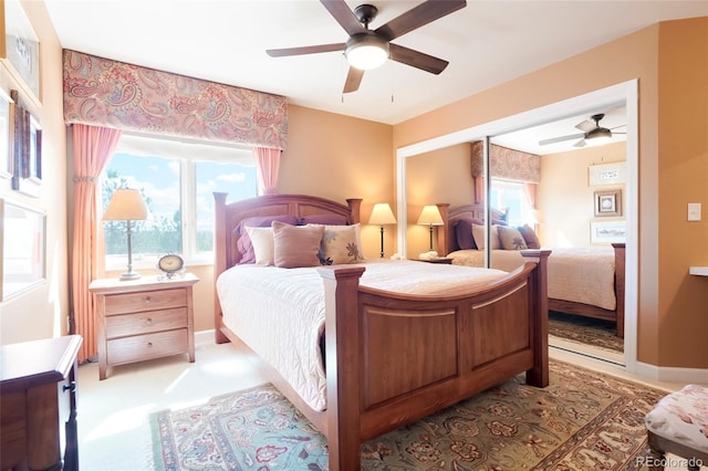bedroom featuring baseboards, carpet, and ceiling fan
