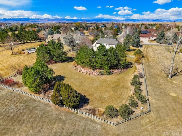 drone / aerial view featuring a mountain view and a residential view