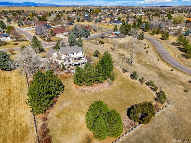 aerial view with a mountain view and a residential view