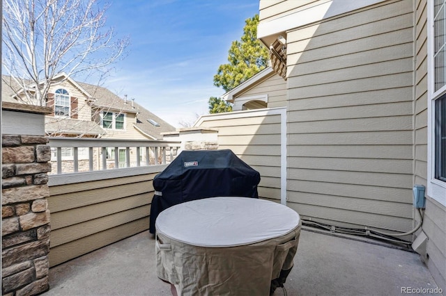 view of patio featuring a balcony and area for grilling