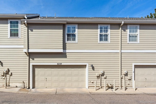 exterior space with a garage