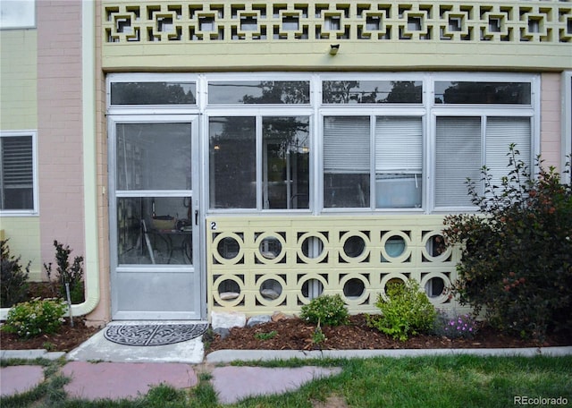 650 S Clinton St Unit 2A, Denver, CO 80247 - view of exterior entry with brick siding
