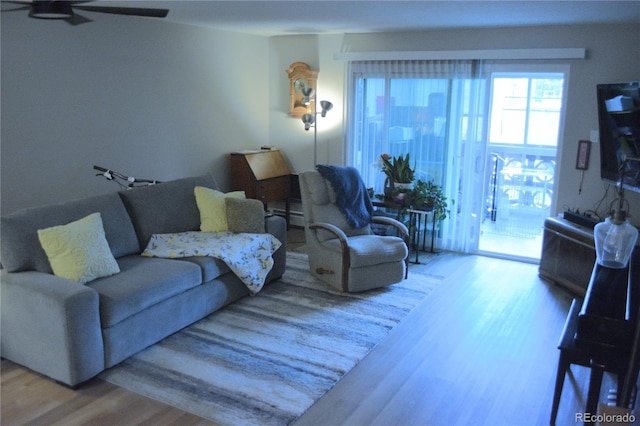 650 S Clinton St Unit 2A, Denver, CO 80247 - living area featuring wood finished floors and a ceiling fan