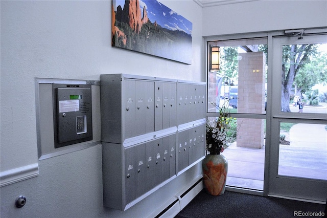 650 S Clinton St Unit 2A, Denver, CO 80247 - detailed view of mail area and a textured wall