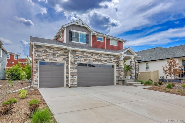 21900 E 46th Pl, Aurora, CO 80019 - craftsman-style home featuring board and batten siding, concrete driveway, stone siding, and an attached garage