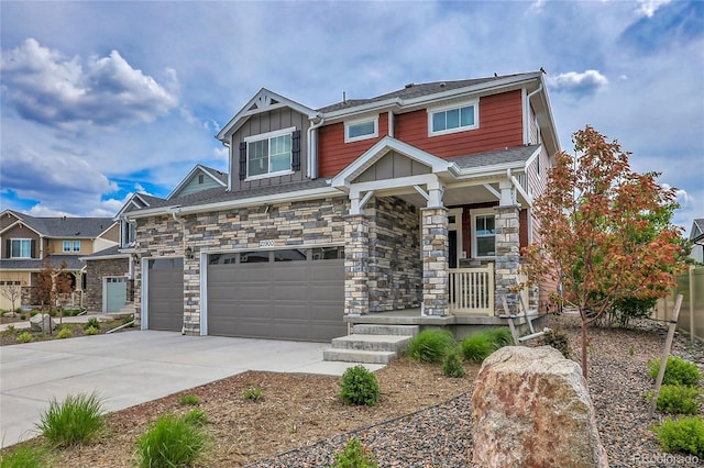 21900 E 46th Pl, Aurora, CO 80019 - craftsman-style home with covered porch, concrete driveway, board and batten siding, stone siding, and an attached garage