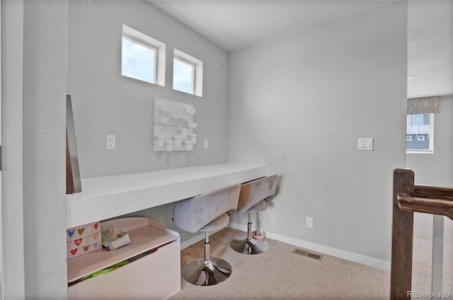 21900 E 46th Pl, Aurora, CO 80019 - carpeted office space featuring built in desk and baseboards