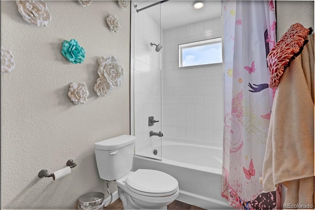 21900 E 46th Pl, Aurora, CO 80019 - full bath with shower / bath combo with shower curtain, toilet, and a textured wall