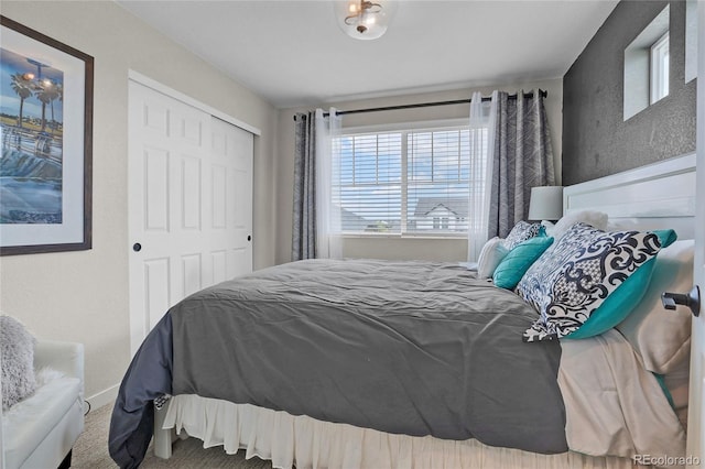 21900 E 46th Pl, Aurora, CO 80019 - bedroom with multiple windows, carpet, and a closet