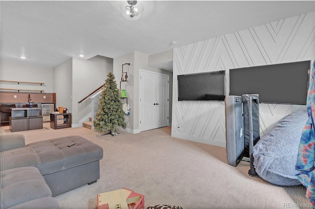 21900 E 46th Pl, Aurora, CO 80019 - carpeted living room featuring stairs, baseboards, and recessed lighting