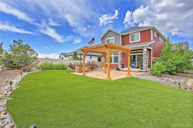 21900 E 46th Pl, Aurora, CO 80019 - back of house with a pergola, a patio area, and board and batten siding