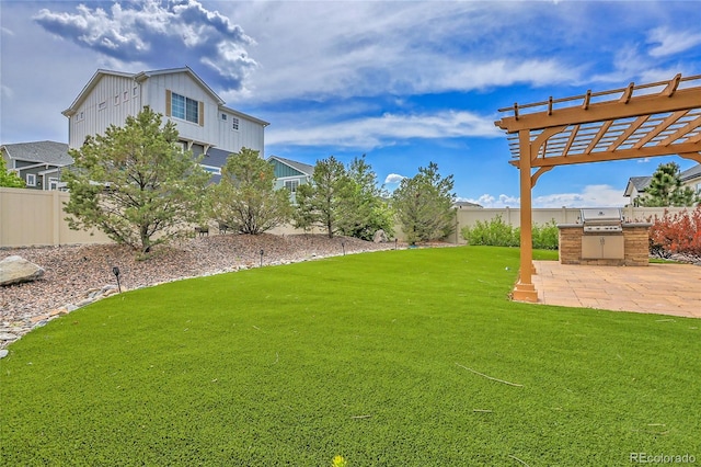 21900 E 46th Pl, Aurora, CO 80019 - view of yard with an outdoor kitchen, a patio, and a pergola