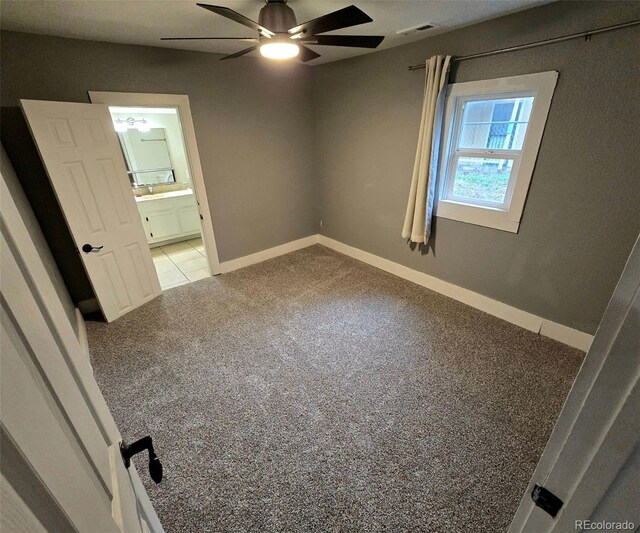 520 Prairie Rd, Colorado Springs, CO 80909 - carpeted spare room with ceiling fan and baseboards