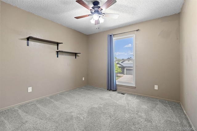 7767 Elmwood St, Littleton, CO 80125 - carpeted spare room featuring a textured ceiling, a ceiling fan, and baseboards
