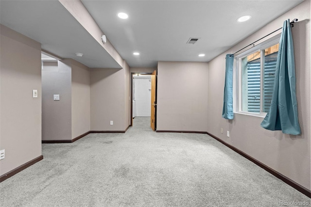 7767 Elmwood St, Littleton, CO 80125 - carpeted spare room with baseboards and recessed lighting