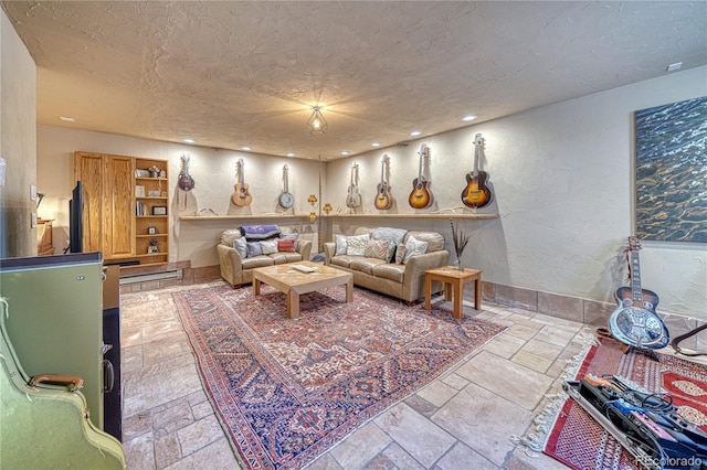 living room with a textured ceiling