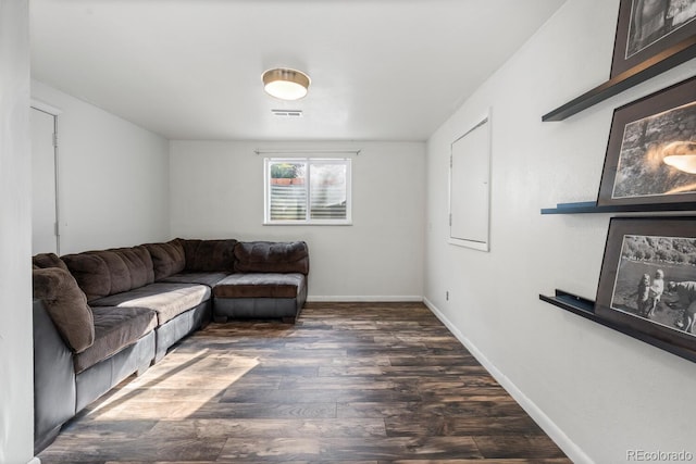 living room featuring dark hardwood / wood-style floors