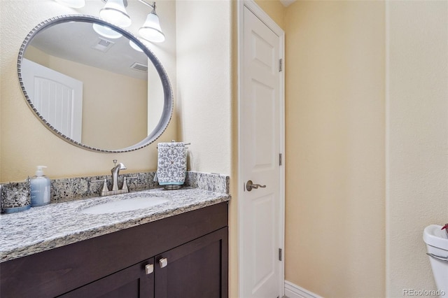 bathroom featuring visible vents and vanity