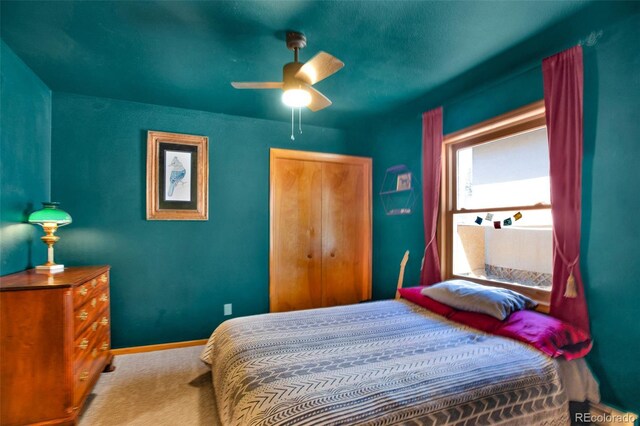 757 Thompson Park Rd, Fairplay, CO 80440 - carpeted bedroom with baseboards, a closet, and ceiling fan
