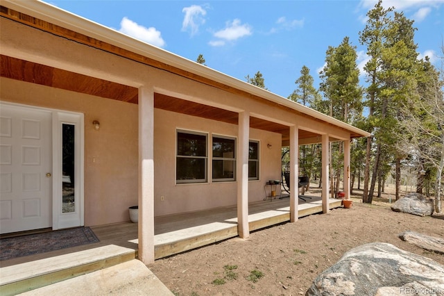 757 Thompson Park Rd, Fairplay, CO 80440 - doorway to property featuring stucco siding and a porch