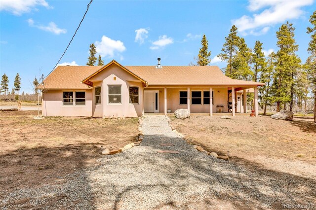 757 Thompson Park Rd, Fairplay, CO 80440 - view of front facade with covered porch and stucco siding