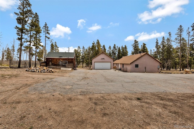 757 Thompson Park Rd, Fairplay, CO 80440 - view of front of home with a garage and an outbuilding