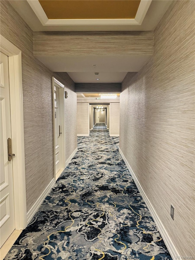 hallway featuring carpet floors