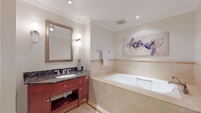 bathroom featuring vanity, tiled bath, tile patterned floors, and crown molding