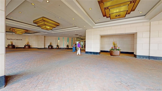 1891 Curtis St Unit 1613, Denver, CO 80202 - common area featuring tile walls and recessed lighting